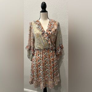Boho style dress by GiGio. Size Large. Faux wrap dress. NEVER WORN!! NWT!!